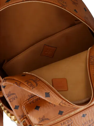 Mcm Logo Studded Backpack In Brown