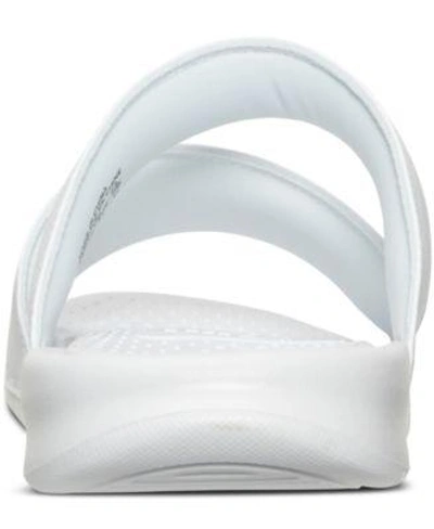Shop Nike Women's Benassi Duo Ultra Slide Sandals From Finish Line In White/metallic Silver