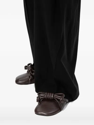 Loewe Bowknot Leather Mules In Animal Print