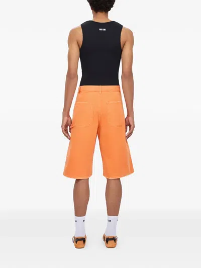 Msgm Pocket Denim Shorts In Orange