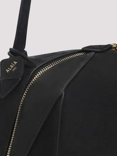 Alaïa Le Bouledogue Bowling Shoulder Bag In Nubuck Leather In Black