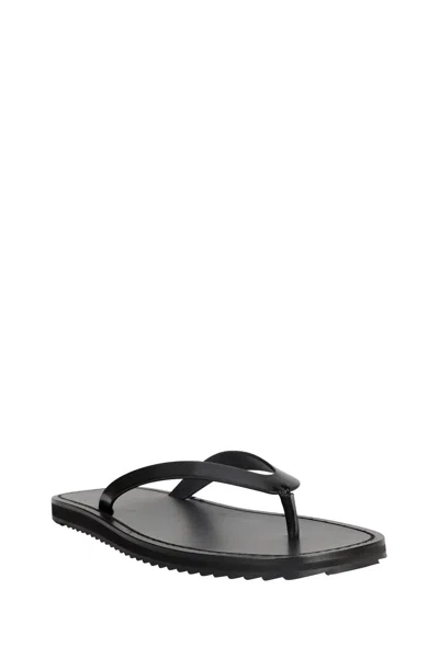 The Row Thong-strap Leather Flip Flops In Black