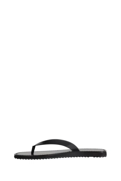 The Row Thong-strap Leather Flip Flops In Black