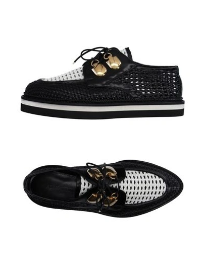 Shop Alexander Mcqueen Laced Shoes In Black