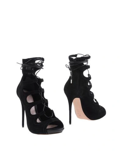 Shop Alexander Mcqueen Ankle Boot In Black