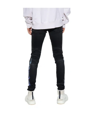 Amiri Flame-patch Jeans In Black