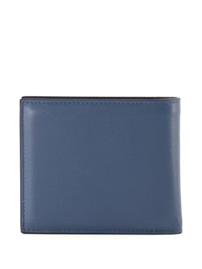 Givenchy Embossed Logo Flap Wallet In Blue