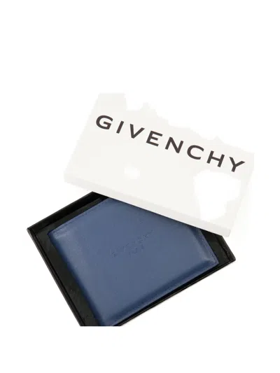 Givenchy Embossed Logo Flap Wallet In Blue