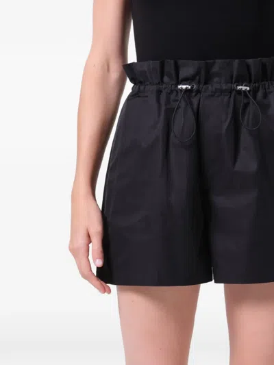 Agolde Lydia Toggle Waist Cotton Blend Shorts In Black