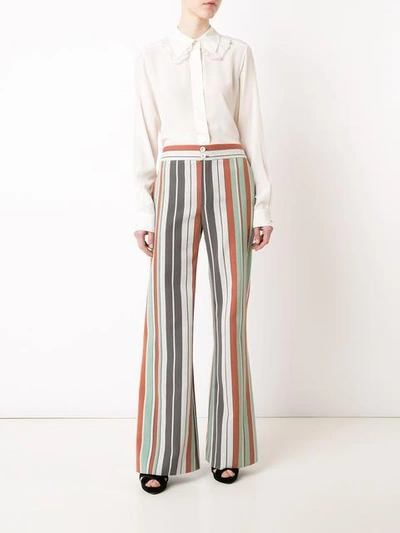 Shop Chloé Striped Flared Trousers In Green