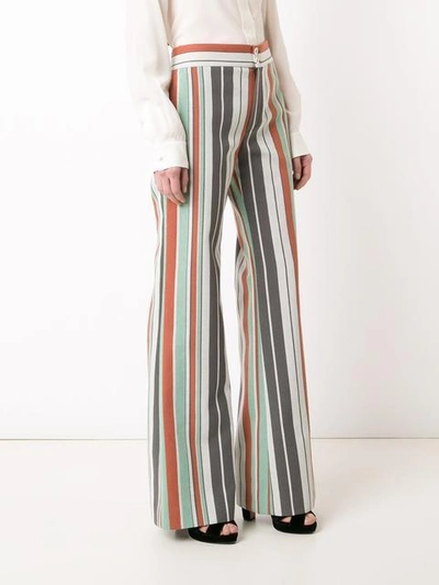 Shop Chloé Striped Flared Trousers In Green