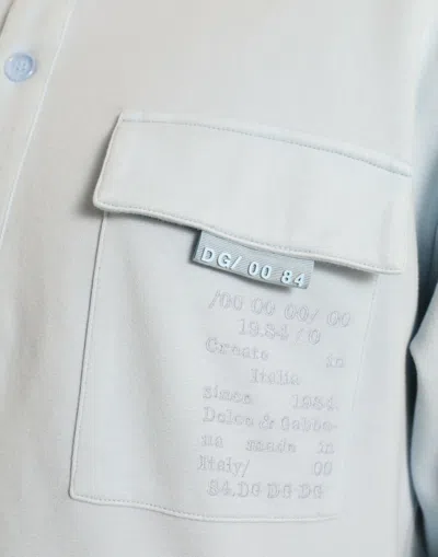 Dolce & Gabbana Light Blue Cotton Buttoned Pullover Sweater In Blue