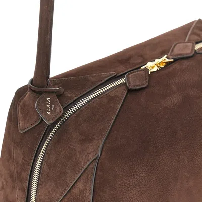 Alaïa Le Bouledogue Bowling Shoulder Bag In Nubuck Leather In Brown