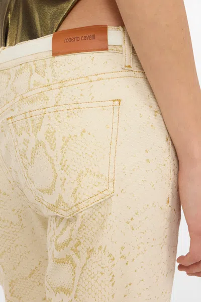 Roberto Cavalli White Flared Jeans With Gold Python Motif In Neutral