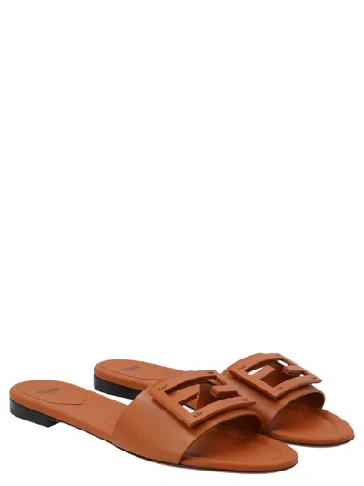 Fendi Baguette Leather Slides With Macro Selleria Topstitches In Brown