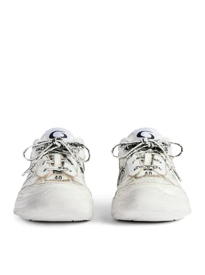 Balenciaga Women Hamptons Worn-out Leather Low-top Sneakers In Neutral