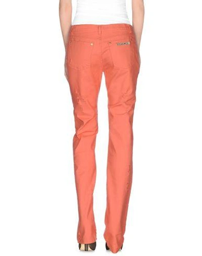 Shop Roberto Cavalli Denim Pants In Salmon Pink