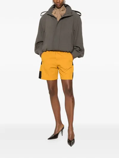 Saint Laurent Cassandre Bicolor Cotton Serge Bermuda Shorts In Yellow