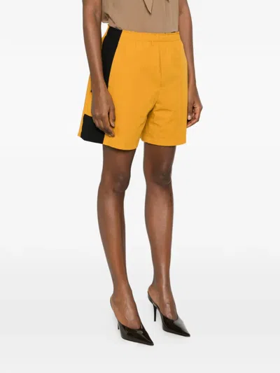 Saint Laurent Cassandre Bicolor Cotton Serge Bermuda Shorts In Yellow