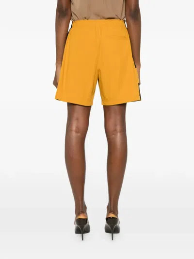 Saint Laurent Cassandre Bicolor Cotton Serge Bermuda Shorts In Yellow