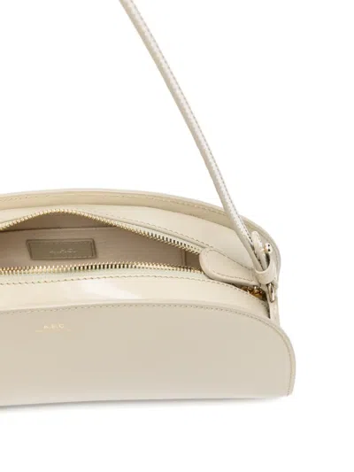 Apc Adjustable-strap Half-moon Shoulder Bag In Neutral