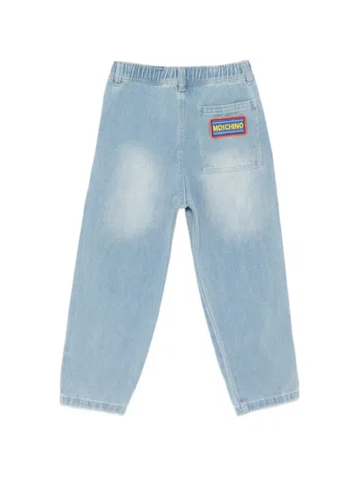 Moschino Elasticated Patch-appliqué Trousers In Blue