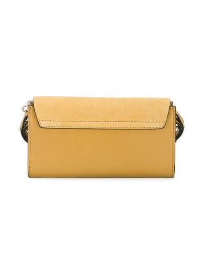 Shop Chloé Yellow Faye Chain Wallet Bag