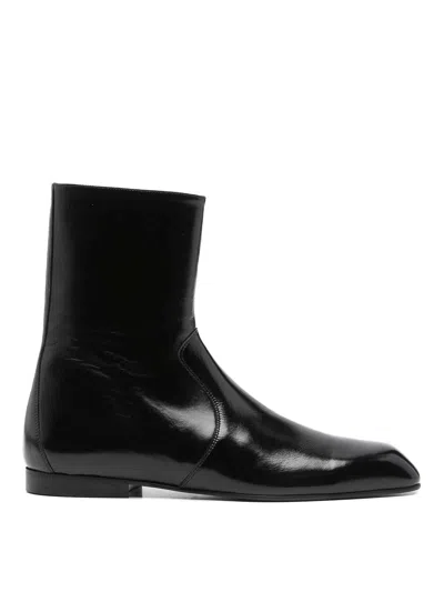 Khaite Glossy Enameled Leather Boot In Black