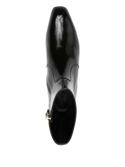 Khaite Glossy Enameled Leather Boot In Black