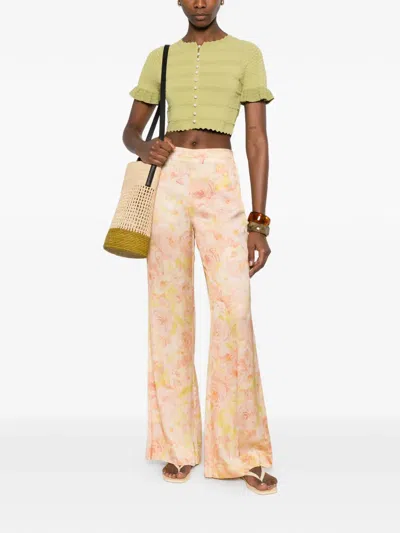Sandro Floral-pattern Trousers In Orange
