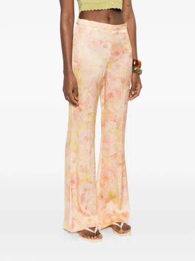 Sandro Floral-pattern Trousers In Orange