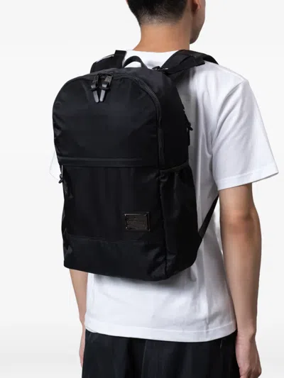 Makavelic Zip Logo Plaque Backpack In Black