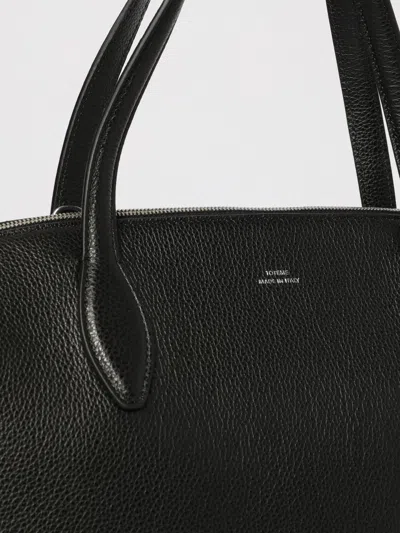 Totême Leather Handbag With Engraved Logo On The Front In Black