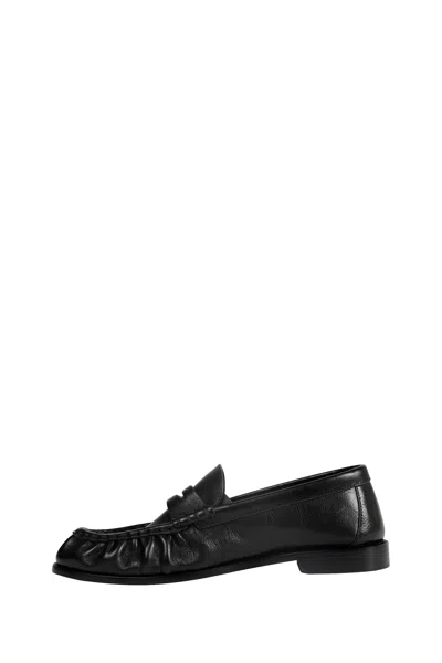 Saint Laurent Le Loafer Loafers In Polished Wrinkled Leather In Black