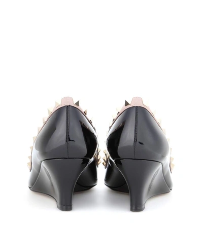 Shop Valentino Rockstud Patent Leather Wedges In Black