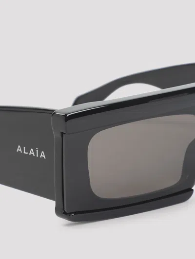 Alaïa Rectangular Frame Dark Lenses Sunglasses Design In Black