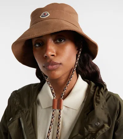 Moncler Logo Patch Drawstring Bucket Hat In Brown