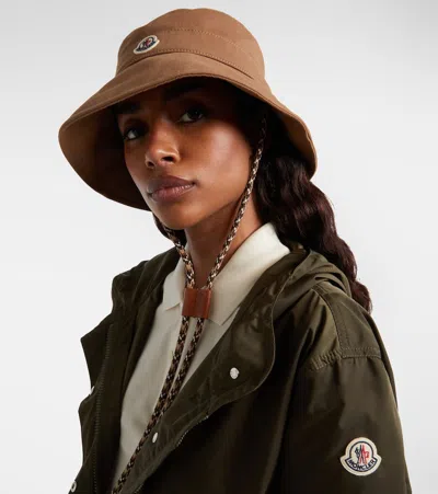 Moncler Logo Patch Drawstring Bucket Hat In Brown
