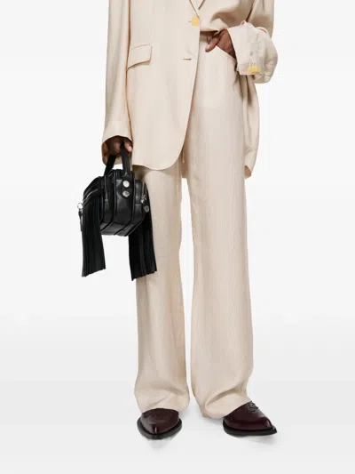 Acne Studios Patterned Trousers In Neutral