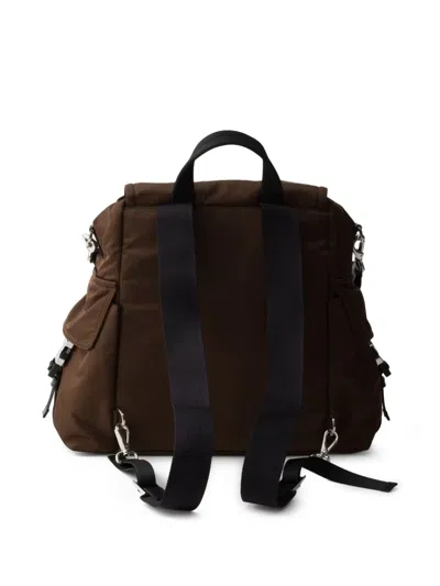 Prada Explore Rucksack Aus Re-nylon Und Leder In Brown