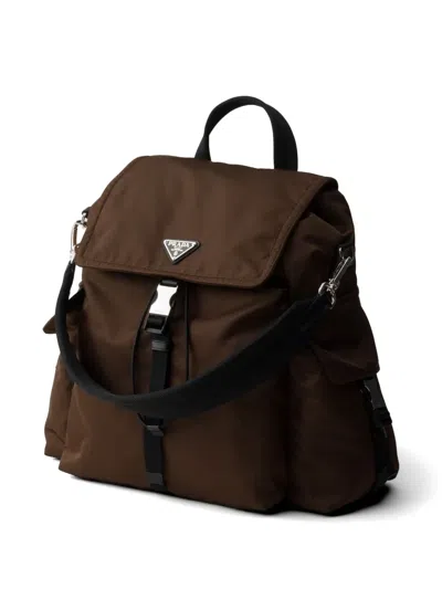 Prada Explore Rucksack Aus Re-nylon Und Leder In Brown