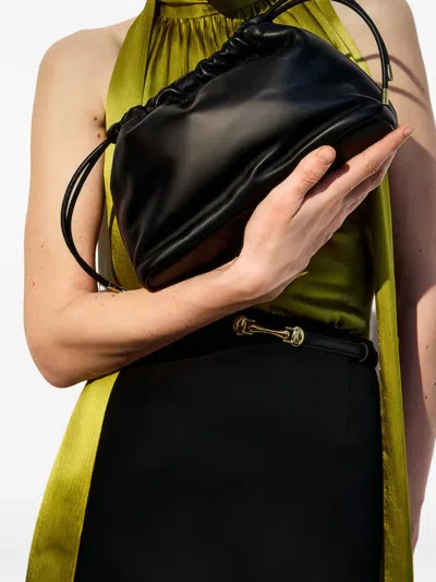 Potamy Drawstring Leather Shoulder Bag In Black