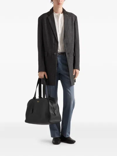 Prada Leather Duffel Bag In Black