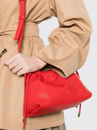 A.p.c. Ninon Mini Structured Side Drawstring Handbag In Red