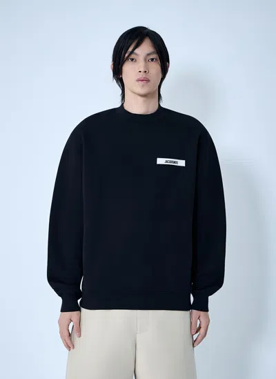 Jacquemus Relaxed Fit Long-sleeve Shirt With Minimalist Patch Detail In Black