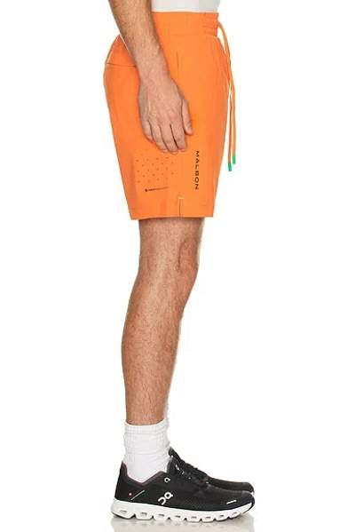 Malbon Golf Performance Poly Tech Short In Orange