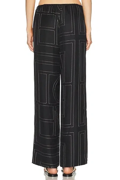 Totême Toteme Women Silk Trousers With Monogram Logo Embroidery In Multi