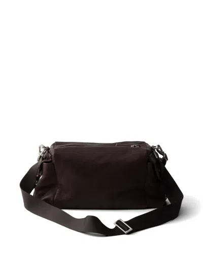 Prada Explore Leather Bag In Brown
