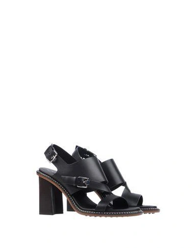 Tod's Sandals In Black