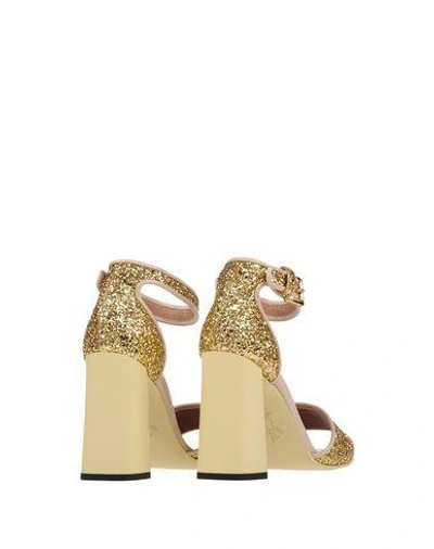 Shop Marni Sandals In Gold